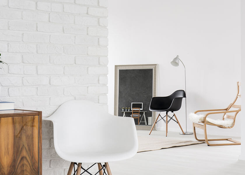 Chair with plastic legs and wood surface